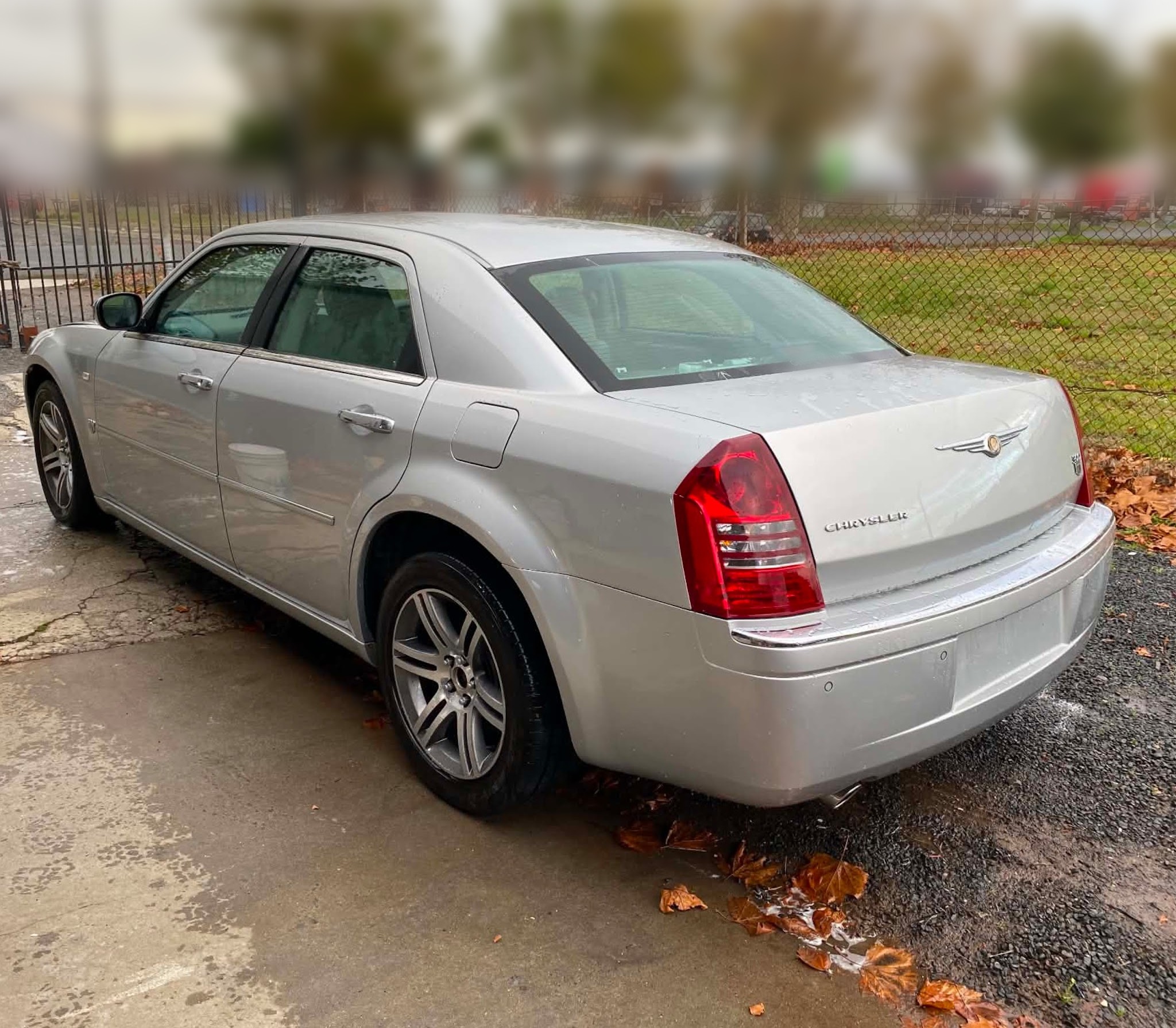 The same Chrysler 300C after repair, rear quarter straight and repainted with no sign of the damage